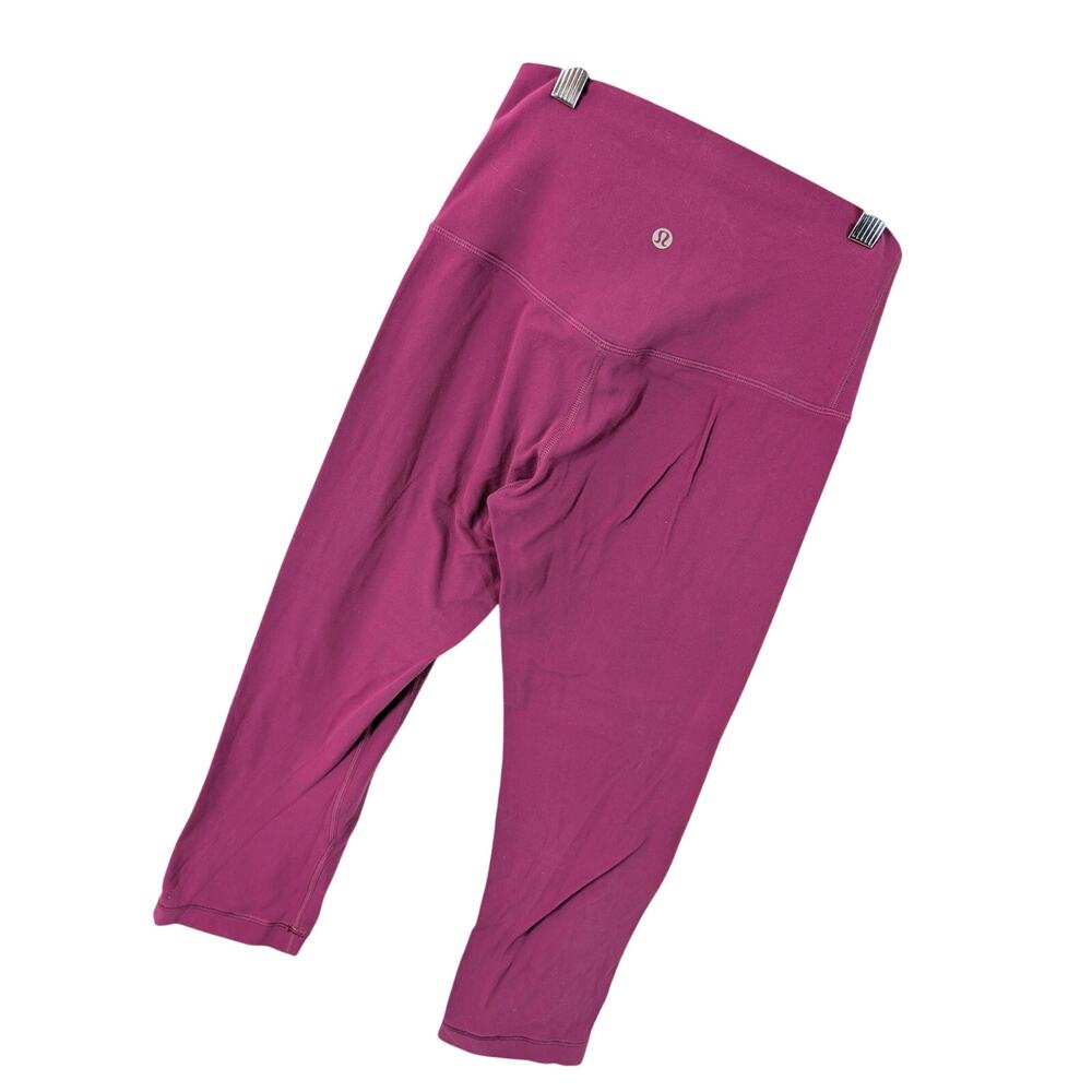 LULULEMON RASPBERRY PINK ULTRA STRETCH, WIDE WAISTBAND LOGO BACK LEGGINGS! SZ 4